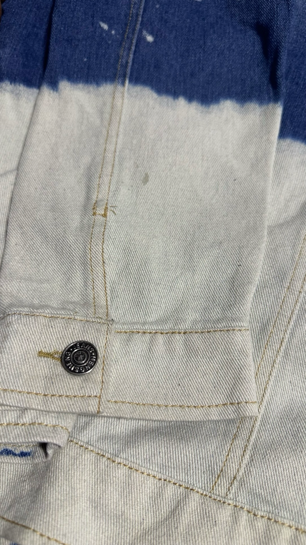Bleached two-toned denim jacket. Distressed