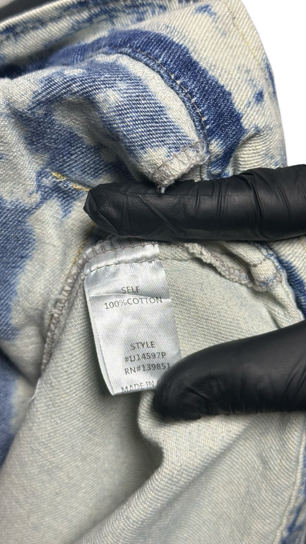 Bleached two-toned denim jacket. Distressed