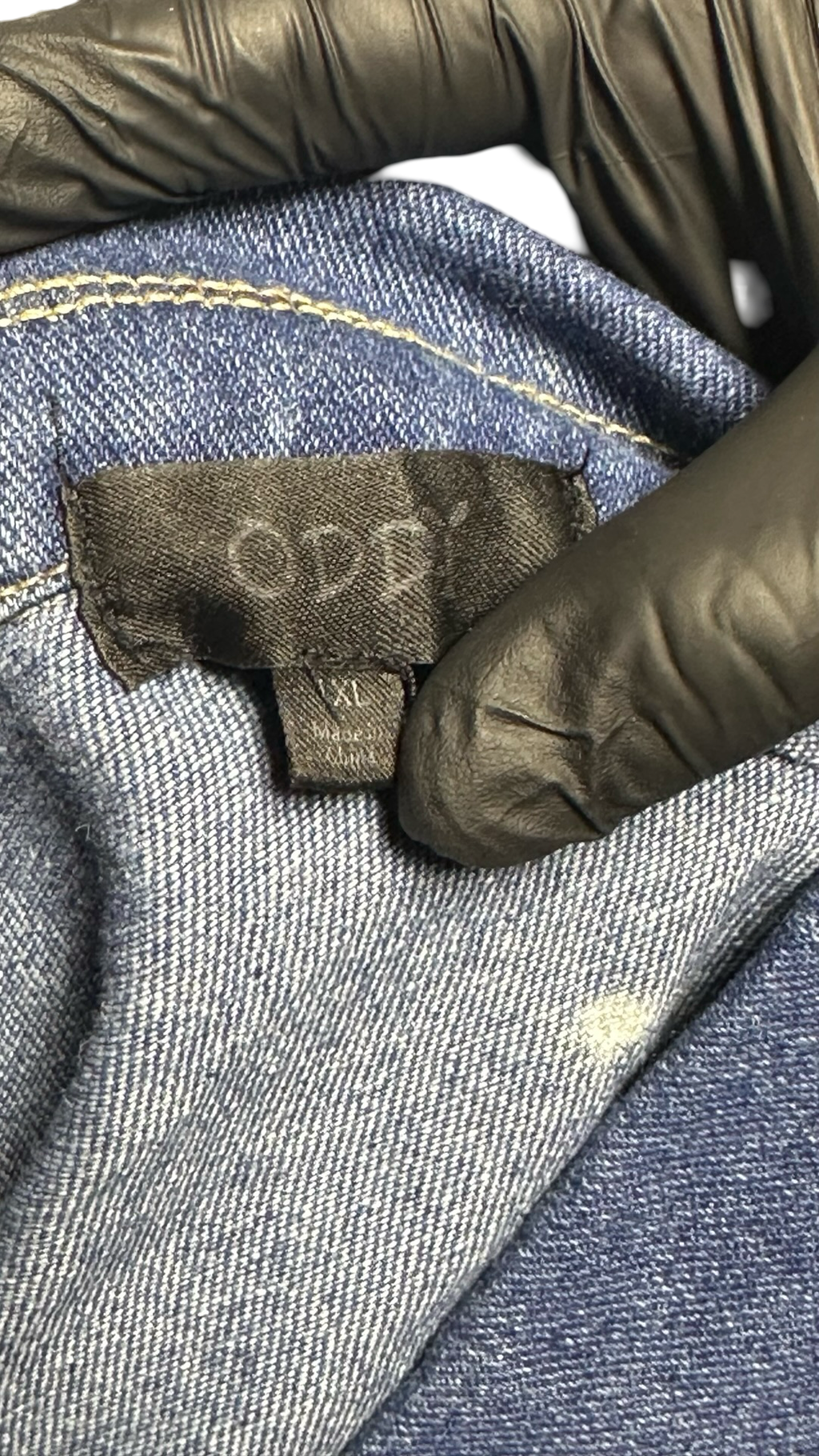 Bleached two-toned denim jacket. Distressed